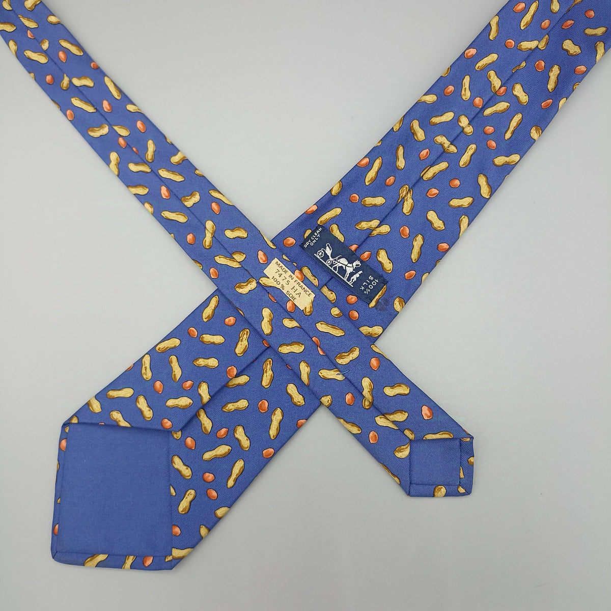 Cravate Hermès bleue à motif coquillage