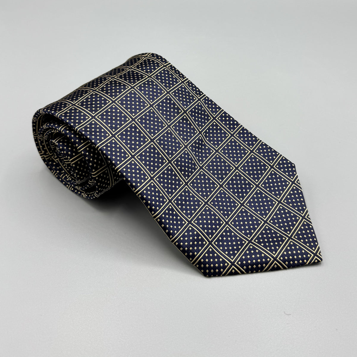 Cravate Stefano Ricci bleu marine à motifs géométriques dorés