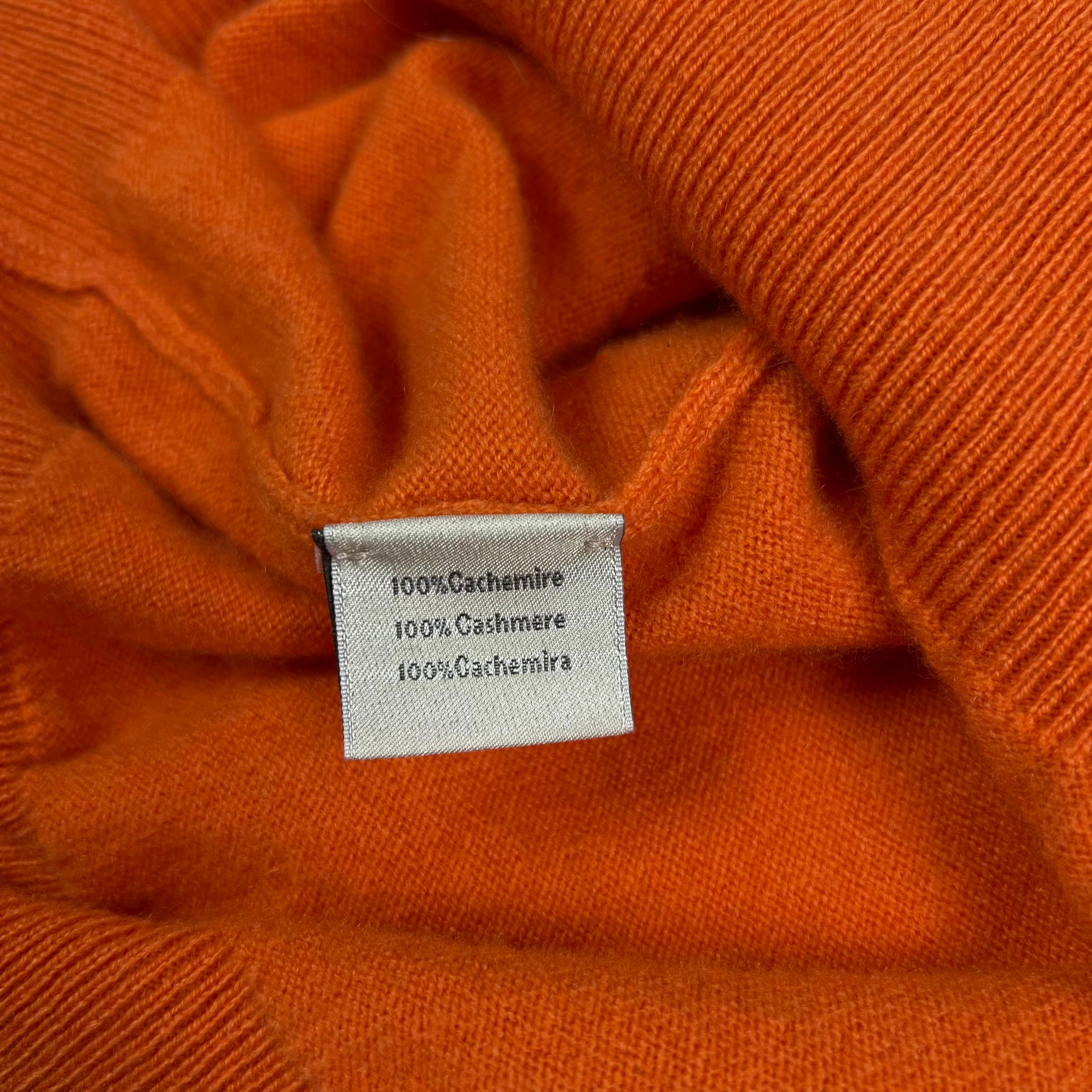 Hermès orange sweater