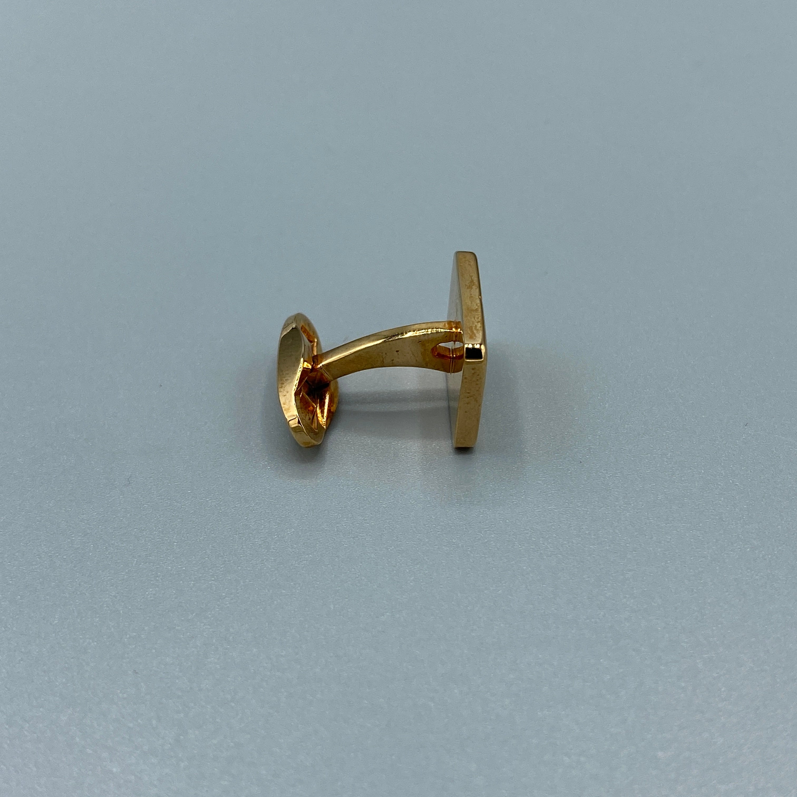 Boutons de manchette et pince à cravate dorés Céline