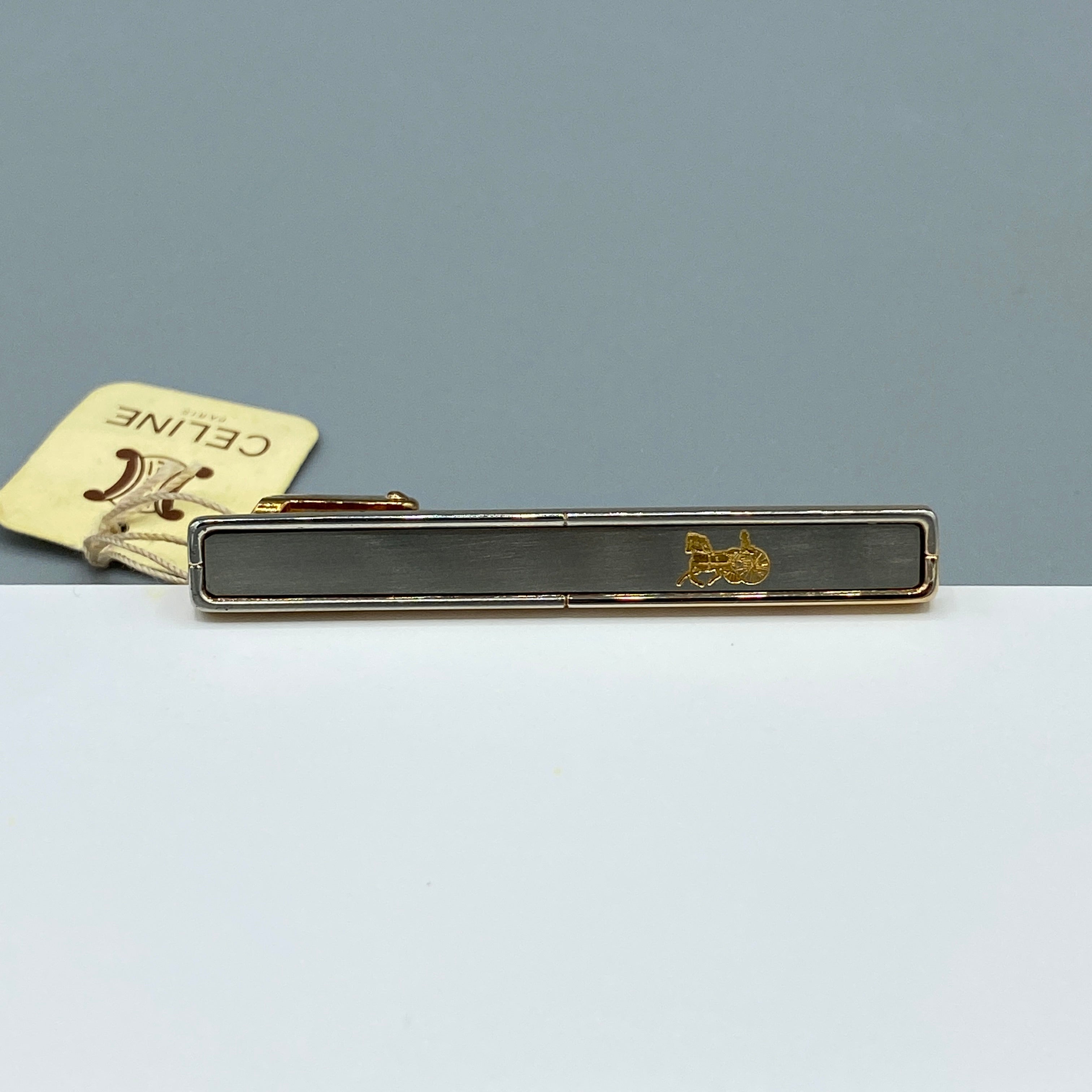 Boutons de manchette et pince à cravate dorés Céline