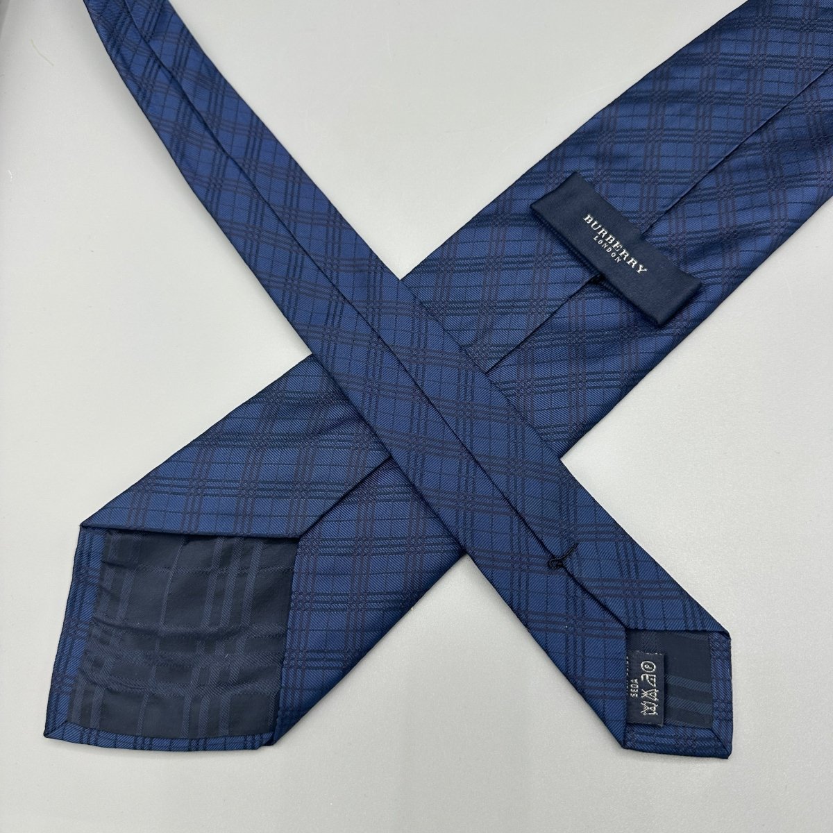 Cravate bleue Burberry à carreaux - Le Beau Gustave