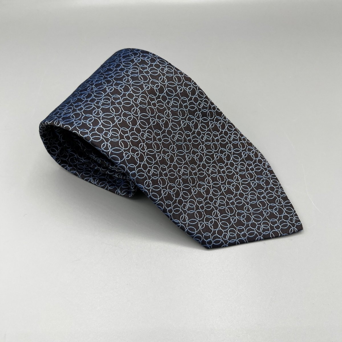 Cravate Hermès marron avec bulles bleues - Le Beau Gustave
