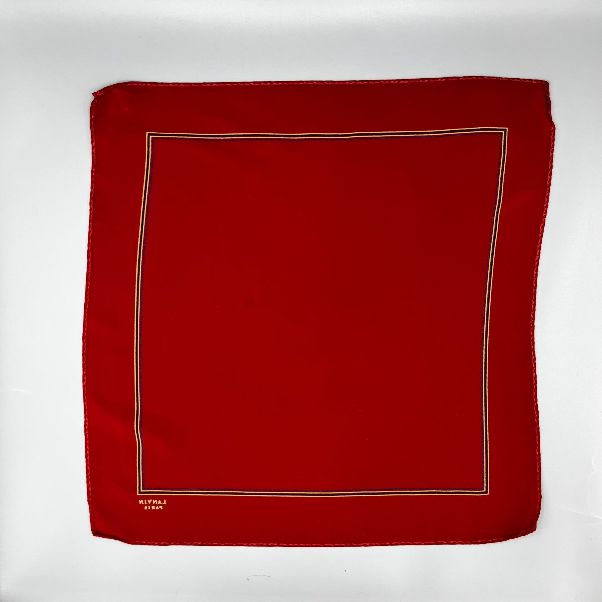 Pochette Lanvin rouge à contour bleu et beige - Le Beau Gustave