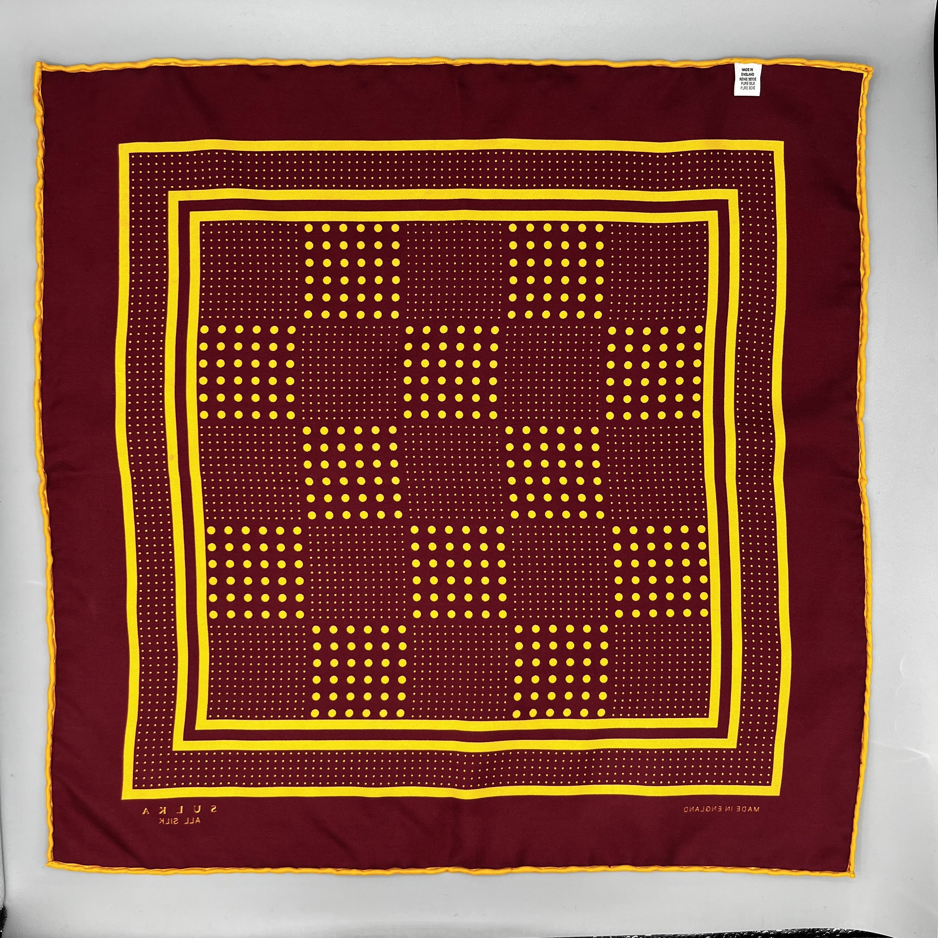 Pochette en soie bordeaux à motifs jaunes Sulka