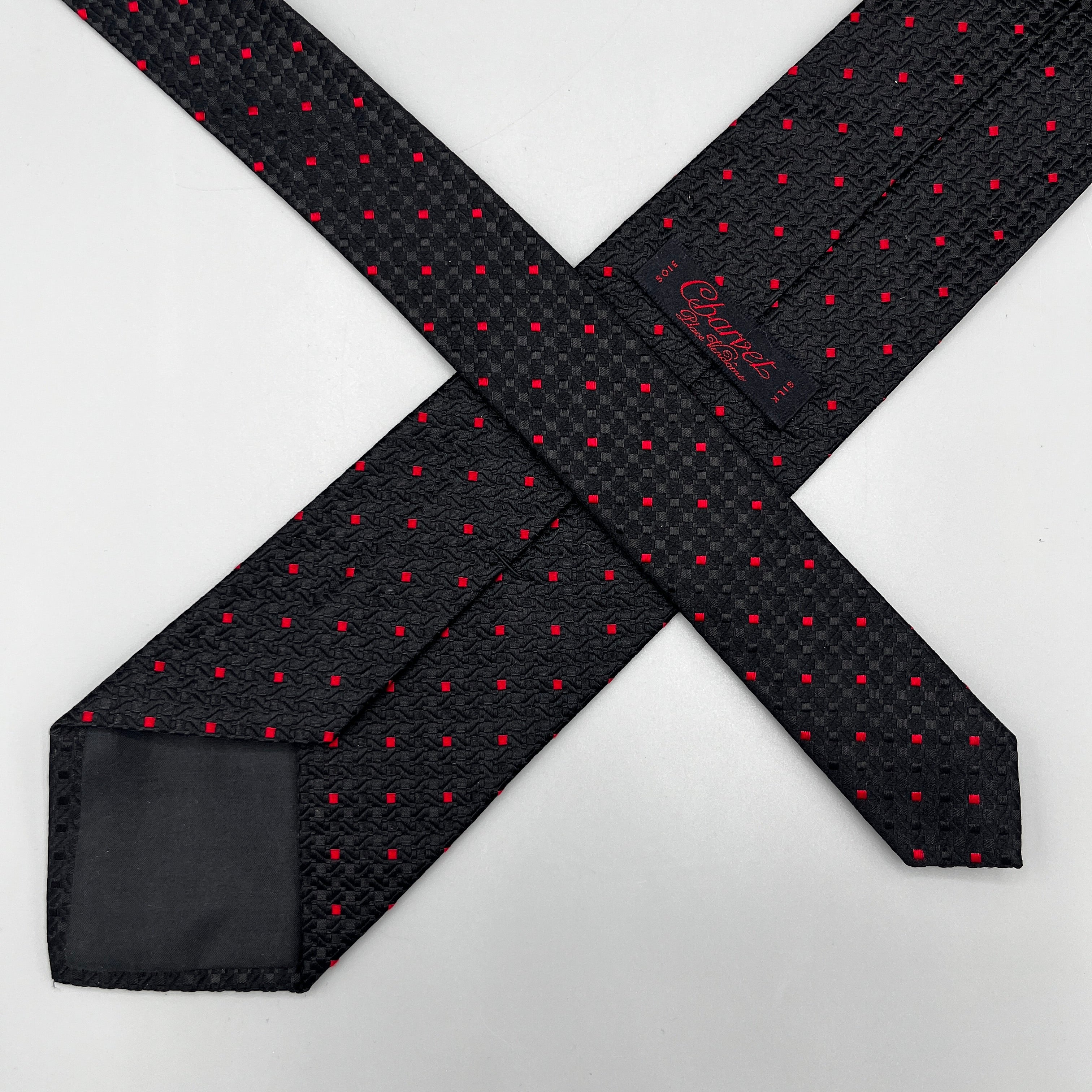 Cravate noire à points rouges Charvet