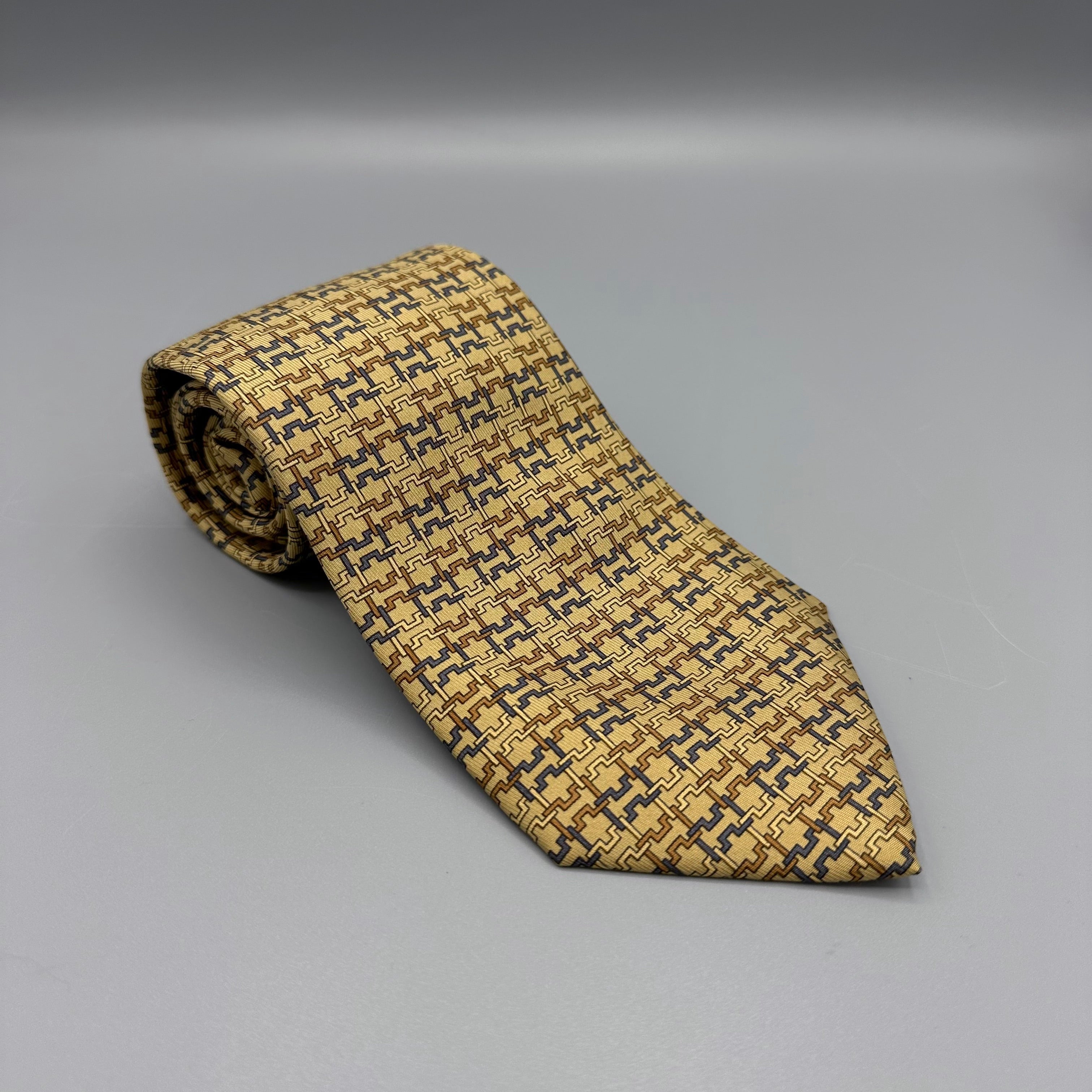 Cravate Hermès jaune à motif H