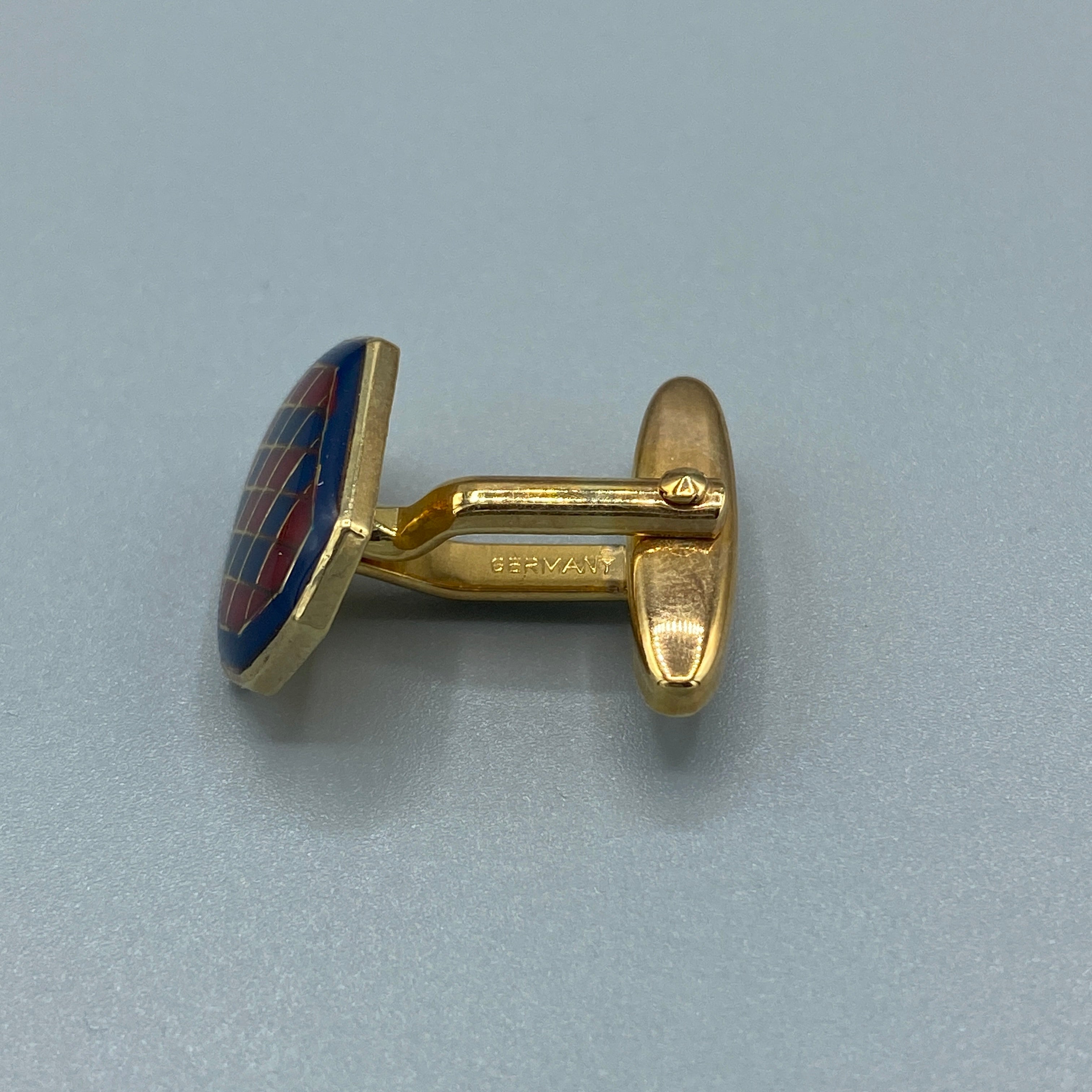 Boutons de manchette dorés à motifs quadrillés