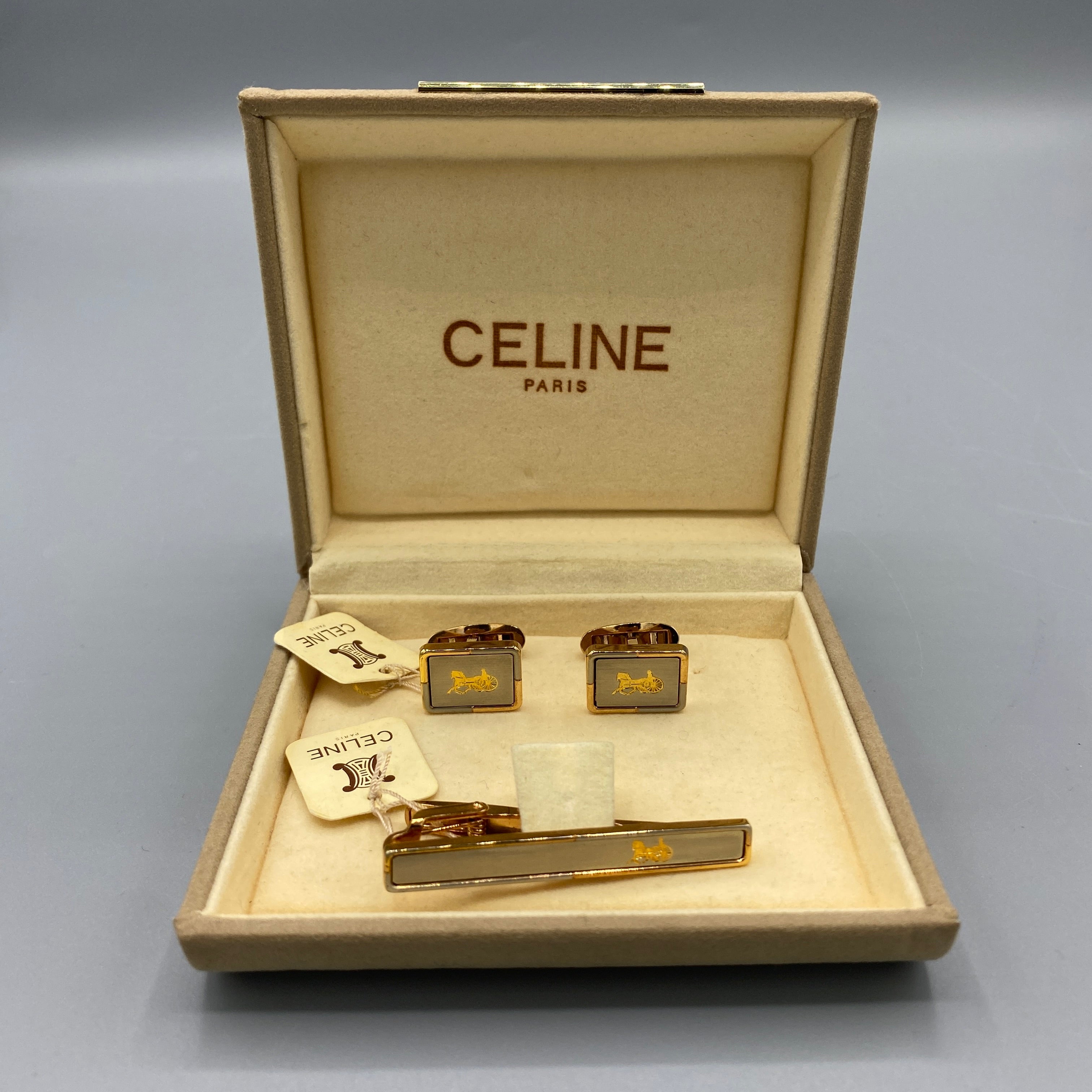 Boutons de manchette et pince à cravate dorés Céline