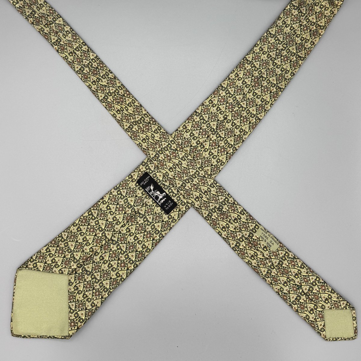 Cravate Hermès à motifs cachemire vert, jaune et marron - Le Beau Gustave