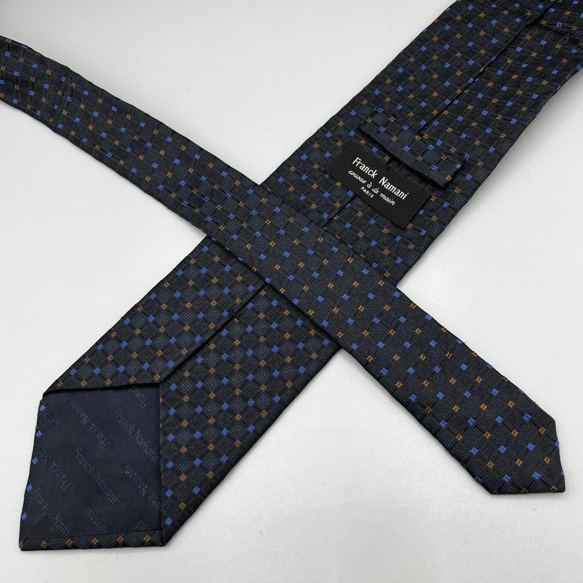 Cravate Namani noire à motifs bleus et bruns - Le Beau Gustave