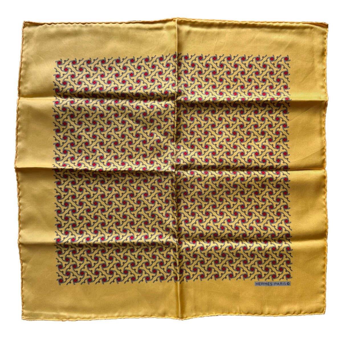 Pochette Hermès jaune à motif géométrique rouge et gris - Le Beau Gustave