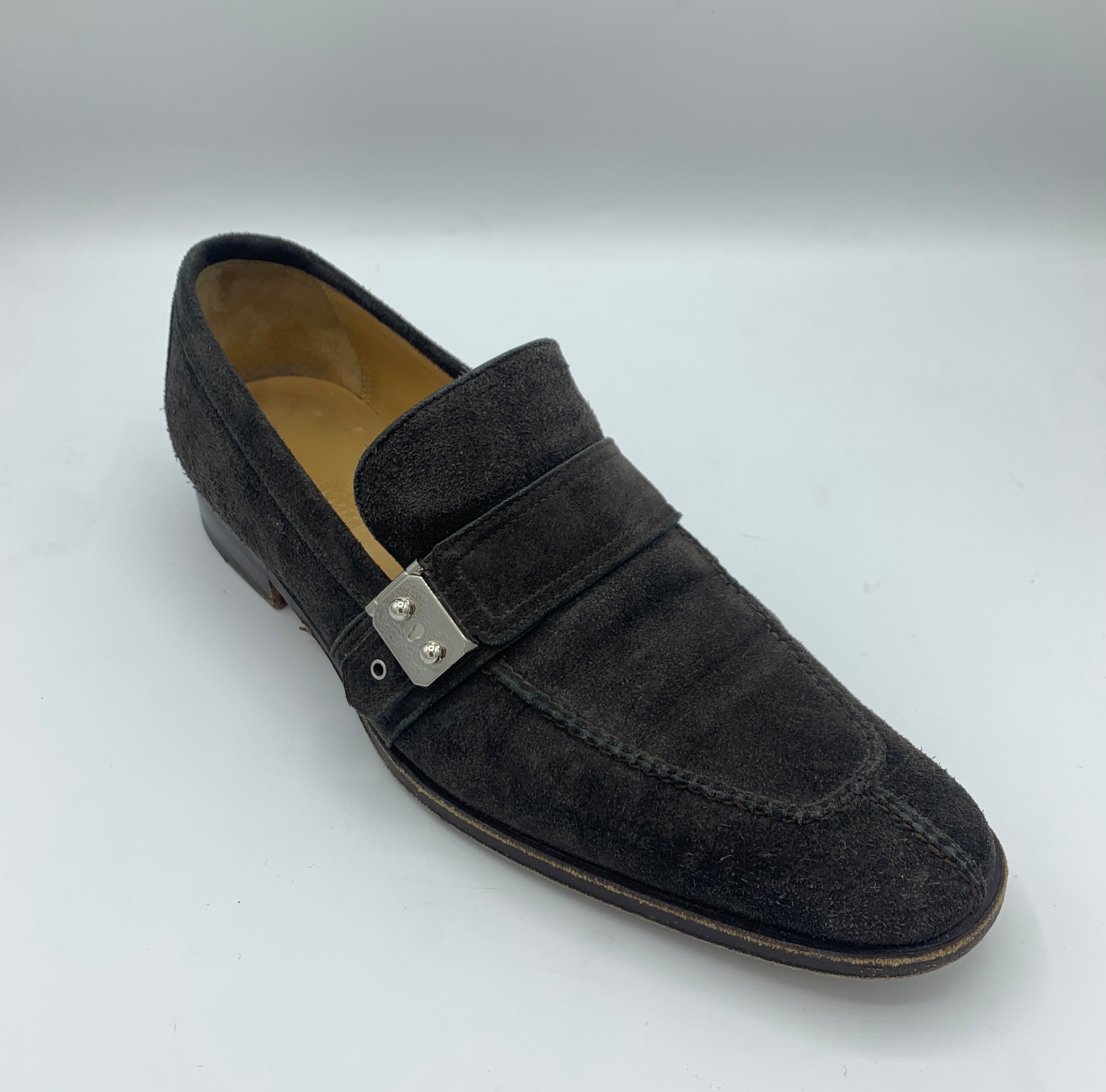 Mocassins Hermès marron glacé à boucles.